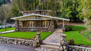 A developer planned to bulldoze this 1910 Oregon bungalow and divide its 1.04-acre lot; a preservationist bought it for $610,000 with only days to act, restored it and it has now sold for $1.47 million