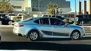 A Las Vegas crossing guard steps in front of speeding car as it bears down on mother, 2 children; came within 10 feet