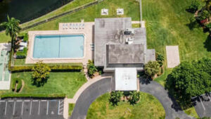 In 2015, Florida man bought Tamarac home for pool and golf-course view; 11 years later, developer building 335 homes gave him 3 days to clear pool area, but county map appears to show patio inside his boundary