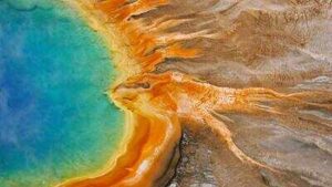 Yellowstone rangers remove 20,100 pieces of trash from geothermal areas in 2026, including more than 5,000 rocks and sticks, 280 visitor hats and over $18 in coins
